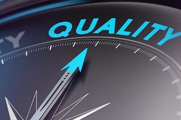 A compass, pointing to the word QUALITY