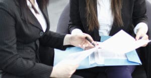Business Couple Working | Iso Certification Online Fast Affordable Fully Accredited iso 90012026 transition