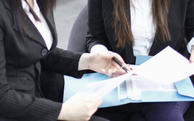Business Couple Working | Iso Certification Online Fast Affordable Fully Accredited iso 90012026 transition